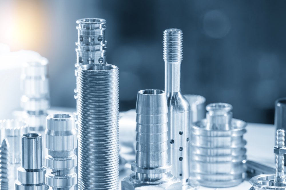 Close-Up Scene of the Set of Pipe Connector Parts for Mold and Die in the Light Blue Scene
